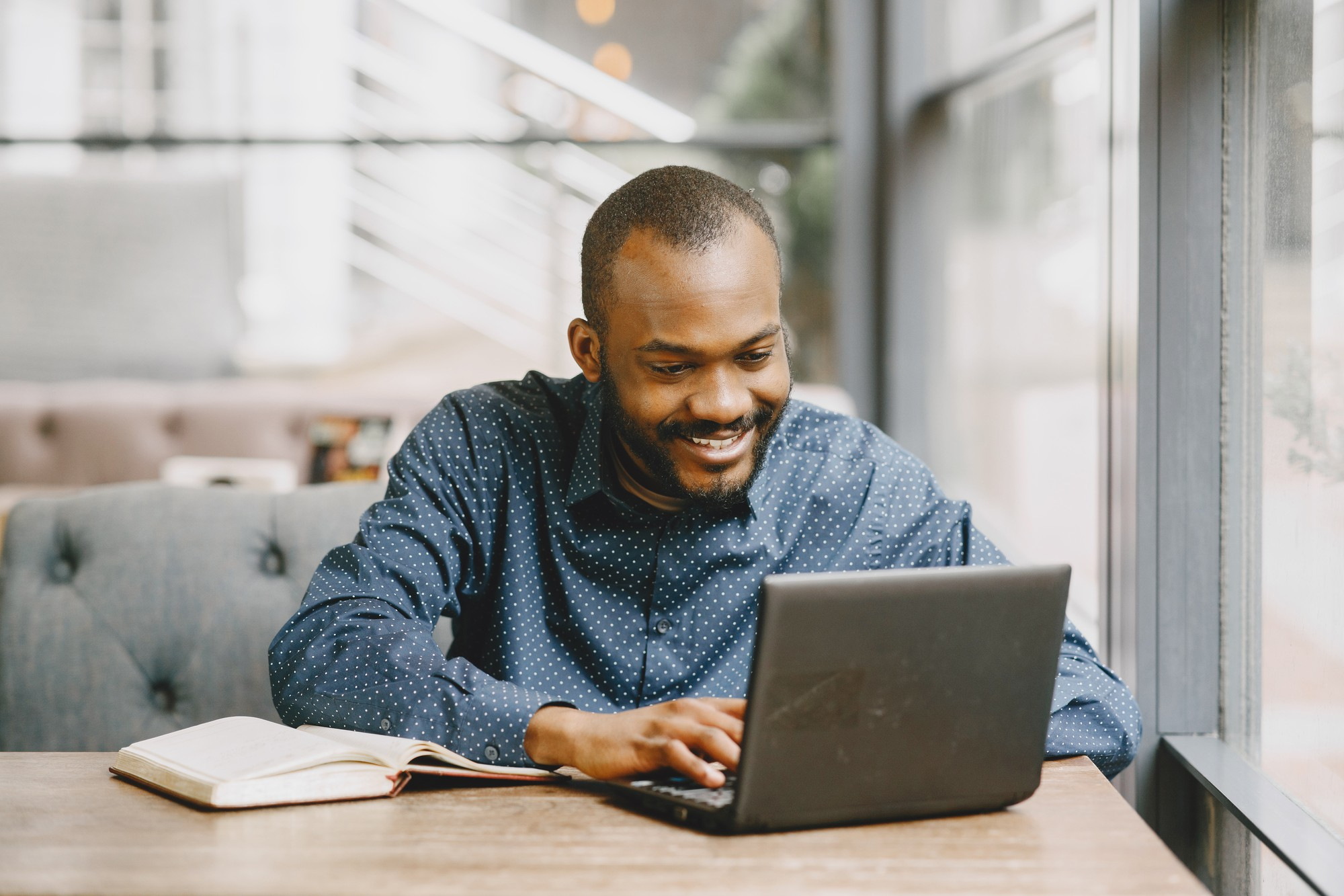 African guy at his laptop